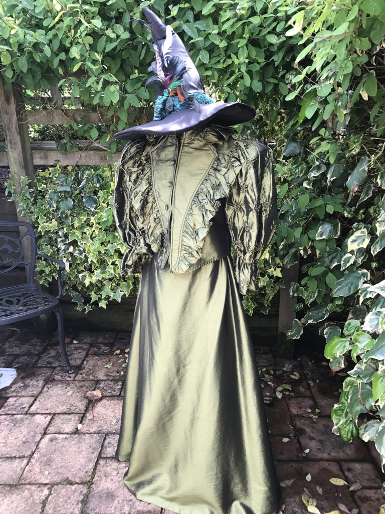 Ladies Victorian Green Witch Costume For Hire. Halloween Fancy Dress